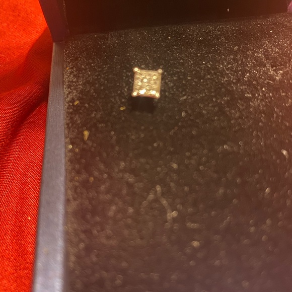 14K with gold single diamond earring, with 9 diamonds.